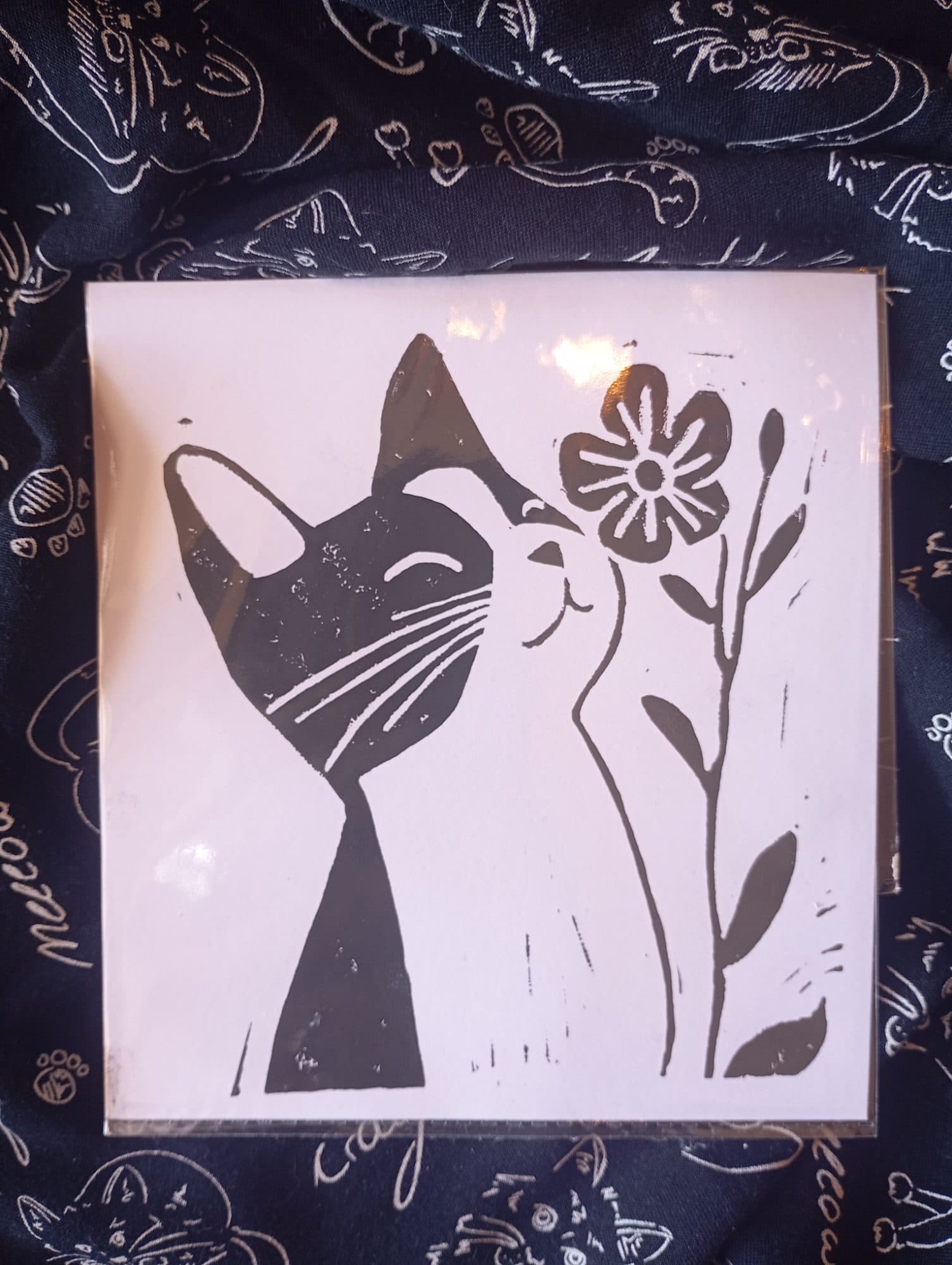Tuxedo Cat Smelling a Flower Lino Print, image 1