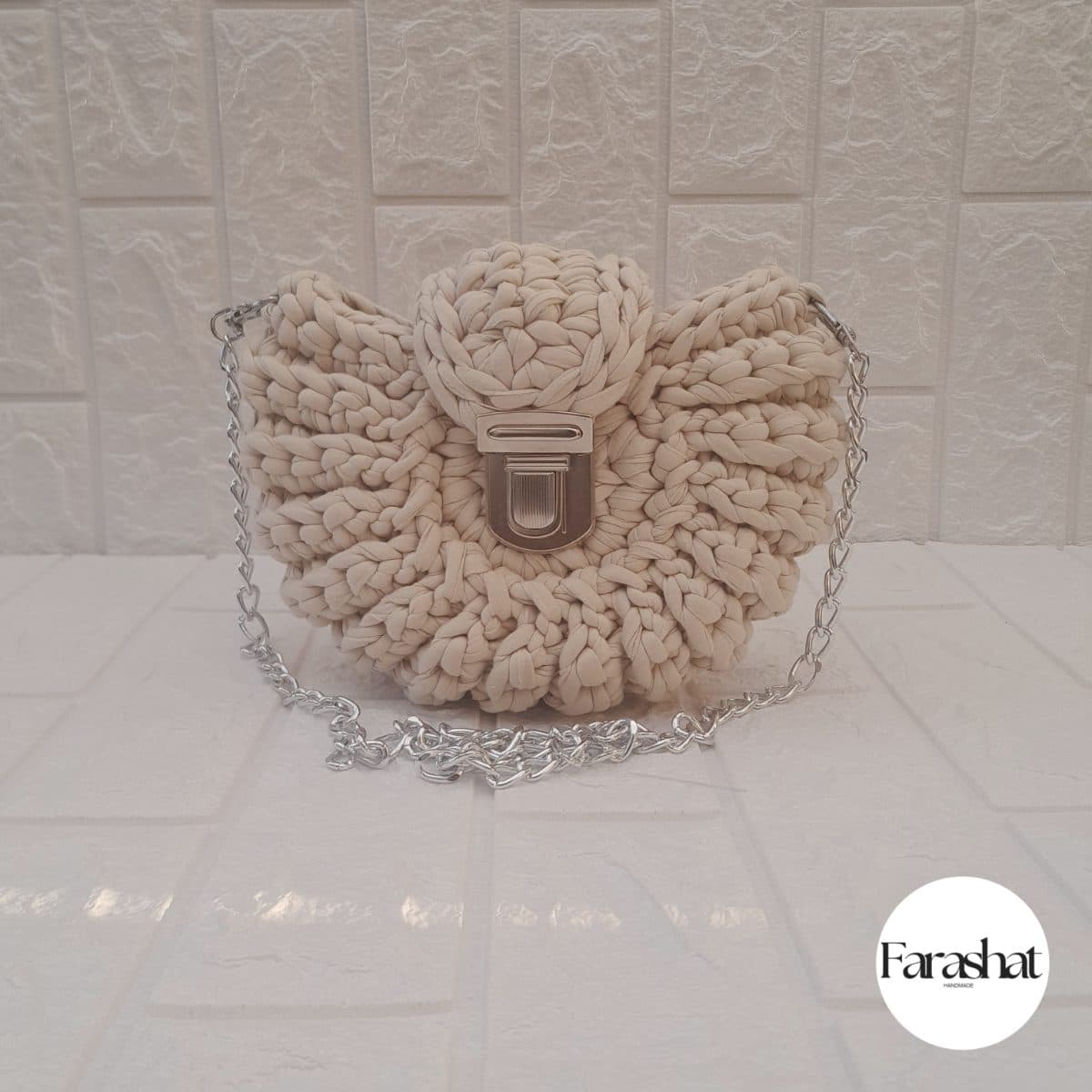 Handmade crochet bag with metal details