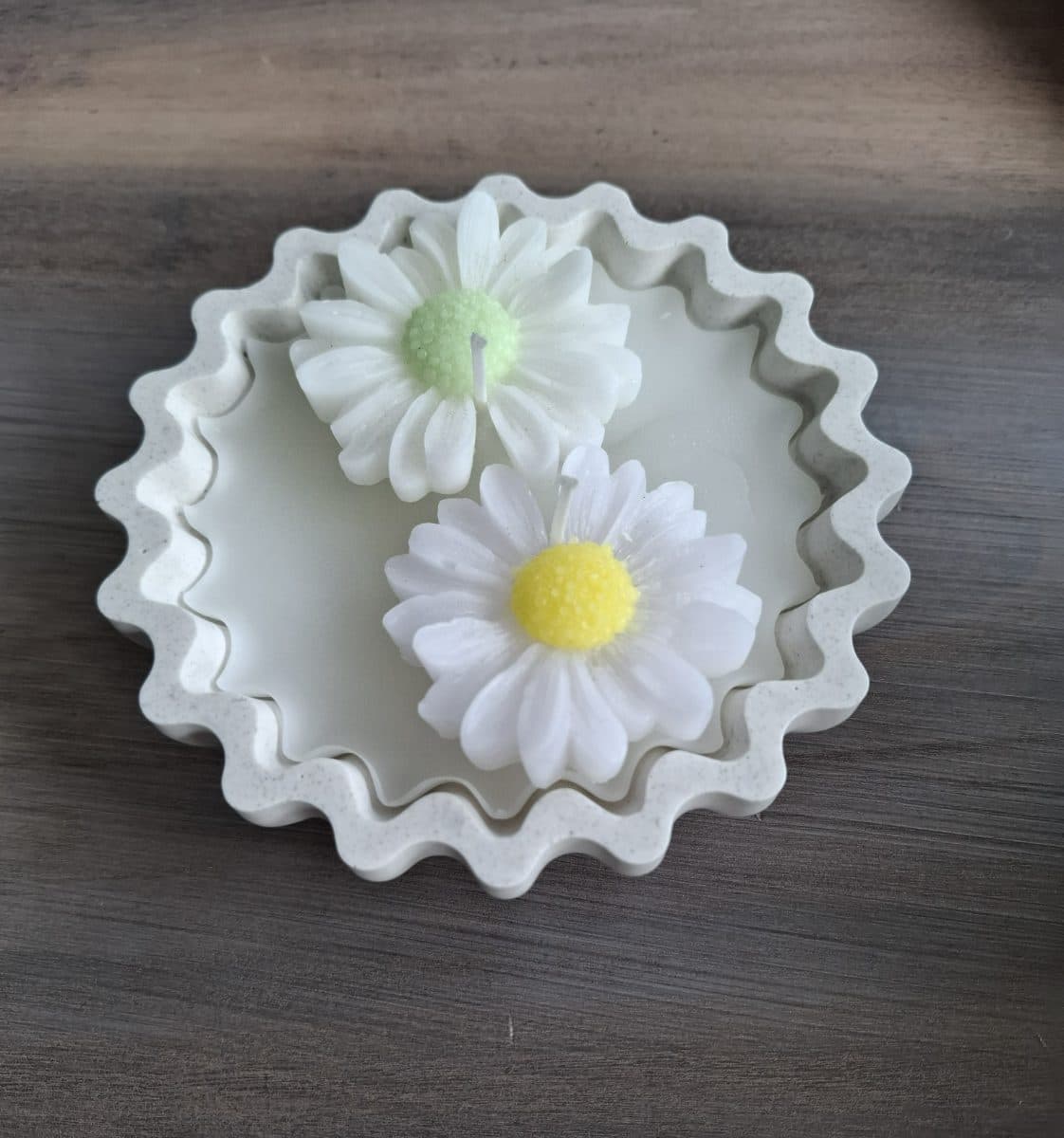 Candle & flowers in bowl